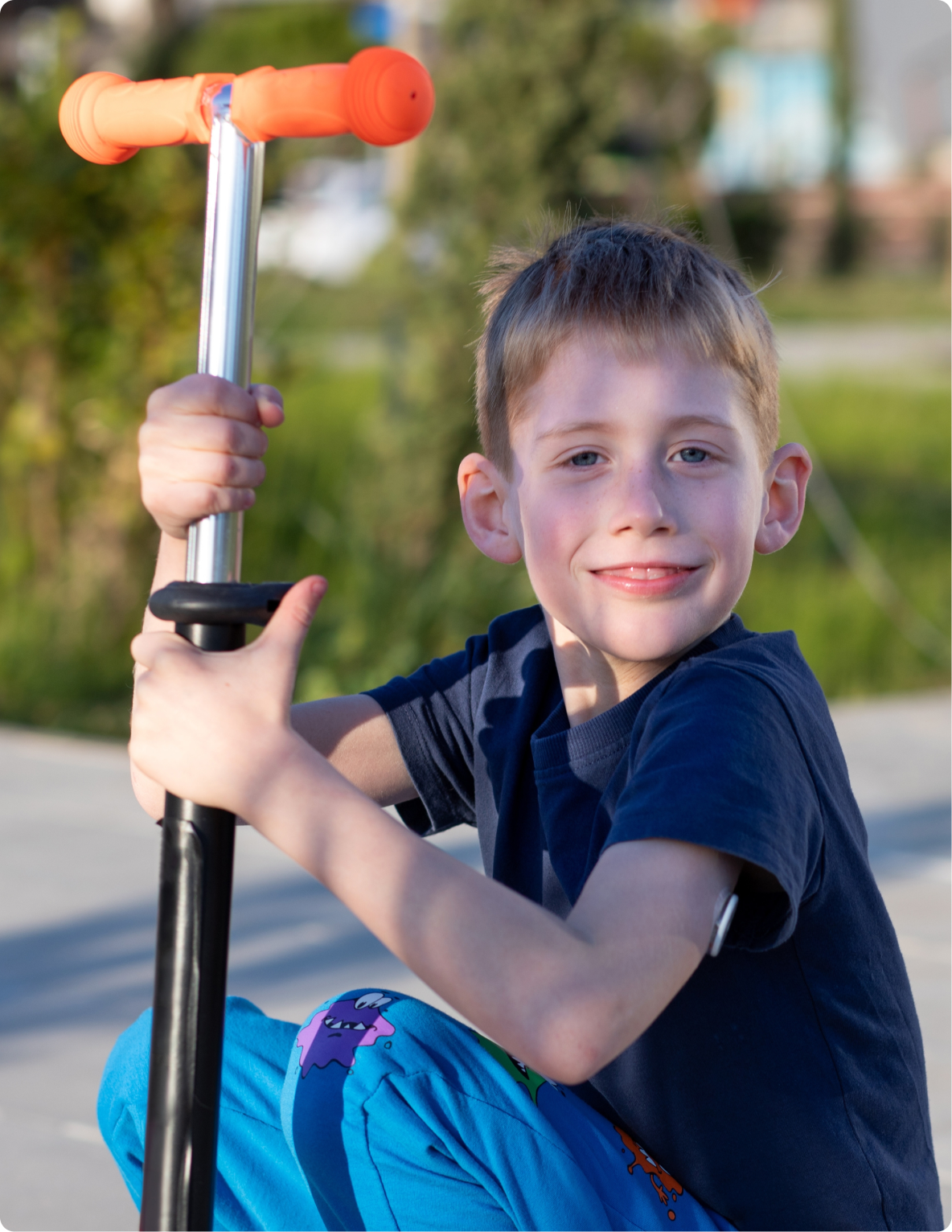 child with scooter